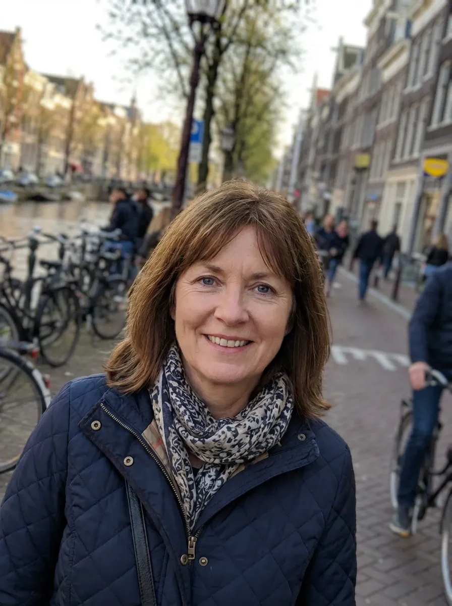Original selfie input — woman in a navy jacket and scarf on the street